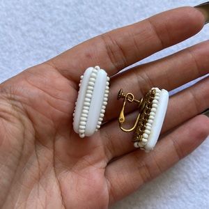 Vintage Miriam Haskell clip on earrings. White & gold